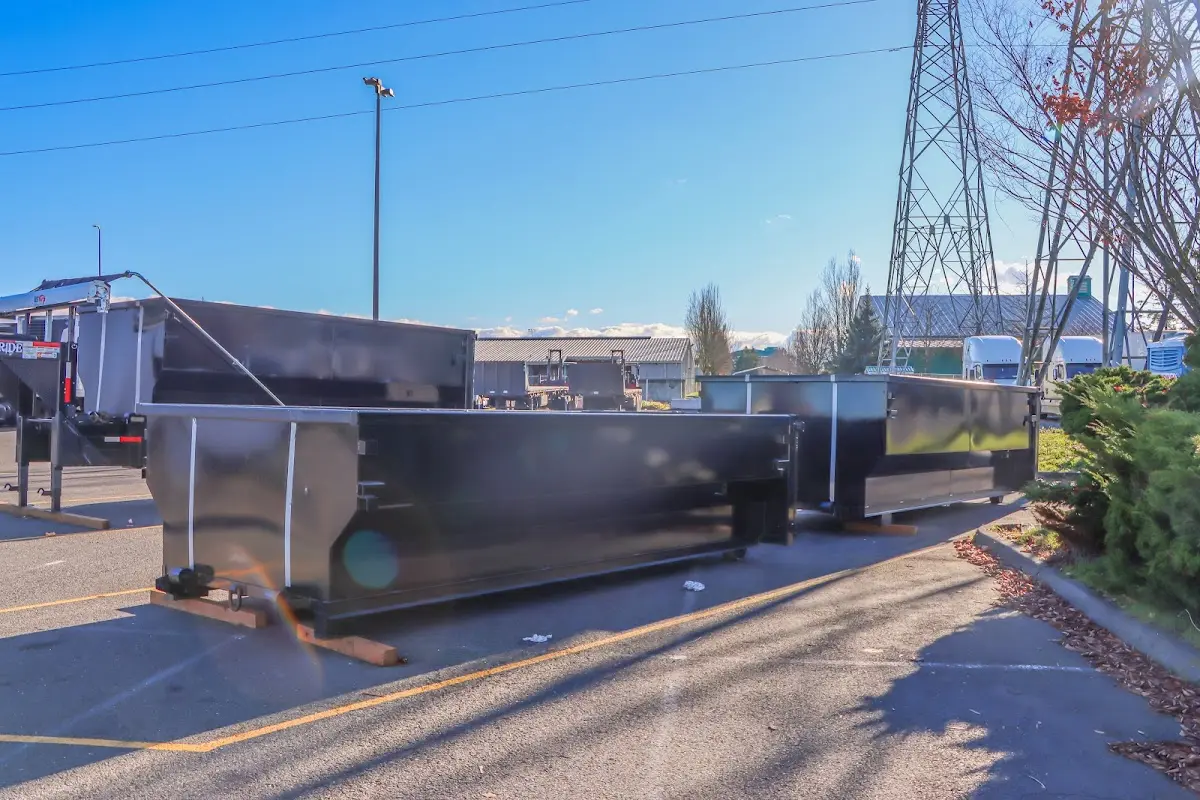 Roll-off dumpster ready for waste disposal at job site for 30 Yard Dumpster Rental in Orion